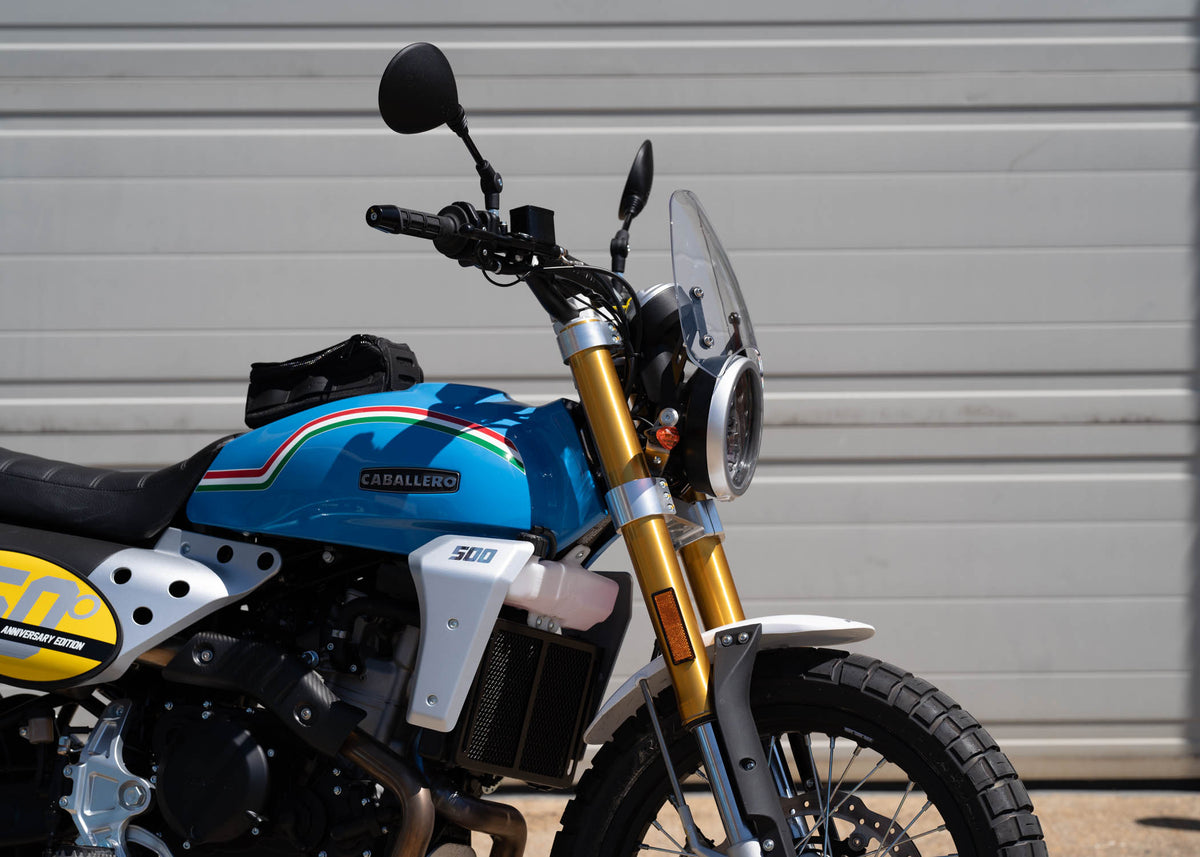 Fantic Caballero in blue with a clear tinted Dart Flyscreen